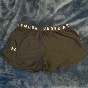 I am selling Under Armour shorts. They are a size L and are black and white.